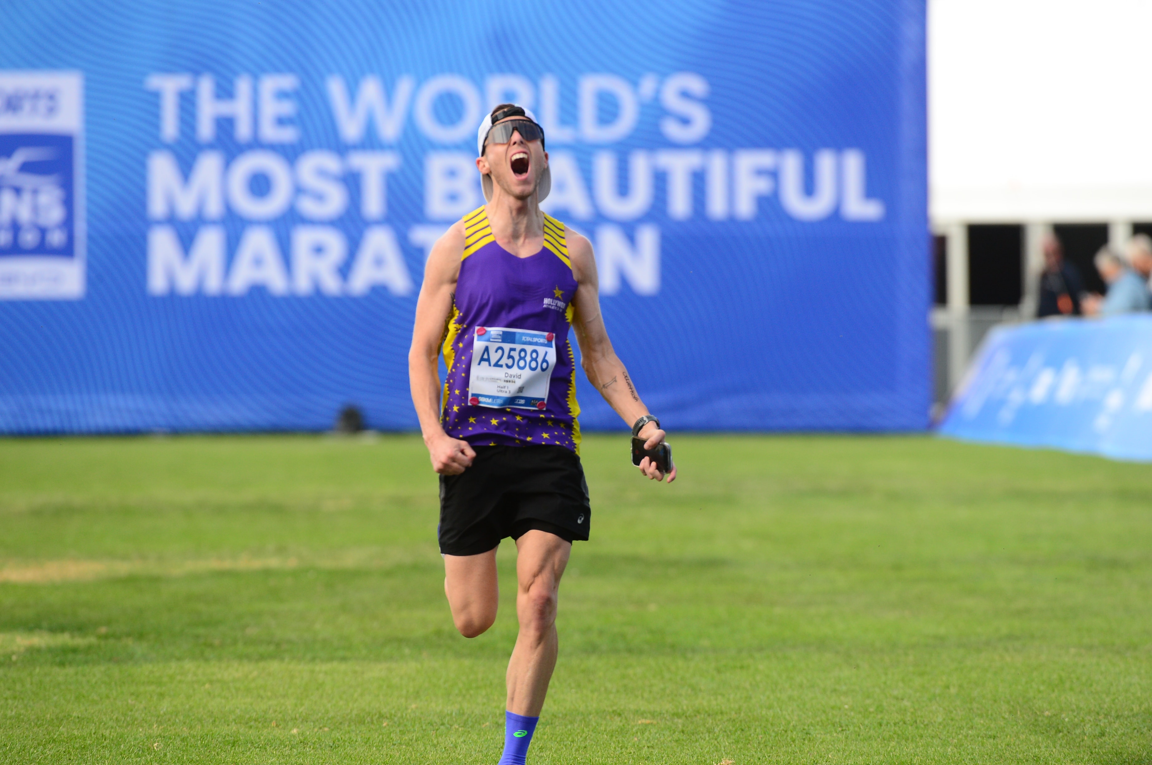David Fick at the finish line of The World's Most Beautiful Marathon